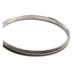 Monet Embossed Silver Metal Bangle Bracelet 7in